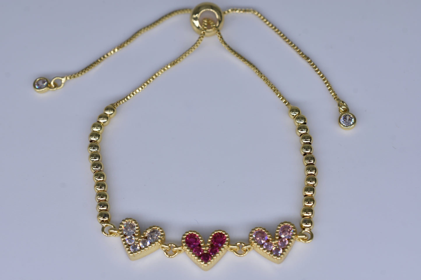 3 Hearts With Pink/Hot Pink Diamonds Gold